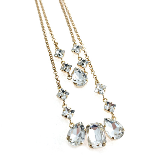 Ottaviani - Collana, bracciale e orecchini dorati con cristalli. 500942.